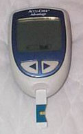 photo of blood glucose test machine