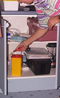 photo of person getting test kit