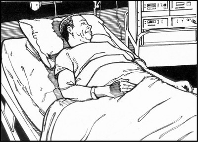 person lying in hospital bed